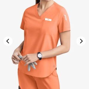 Easy Stretch bright orange scrub top